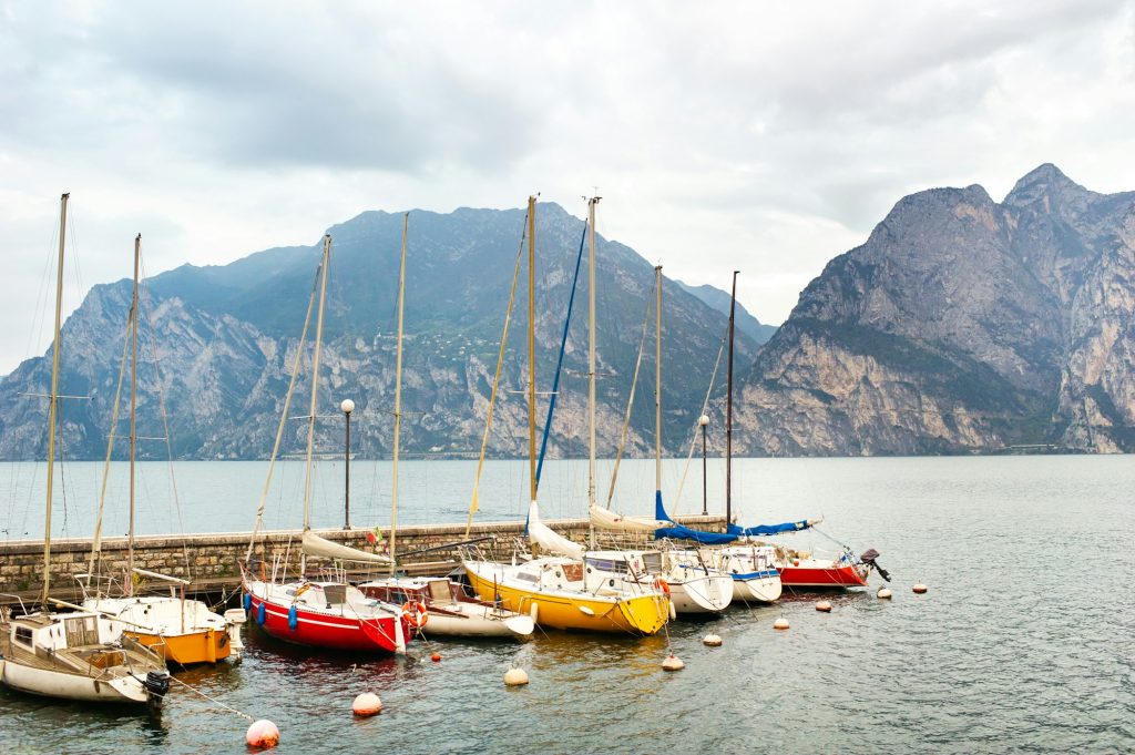 Yachts on the Shore of Lake Garda and in the Alps.Italy.Tuscany  Exclusive Travel Representation - Travel Representation Company for the Tourism Sector