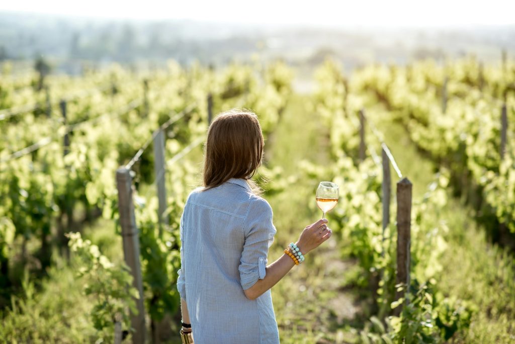 Image of woman with a glass of wine 